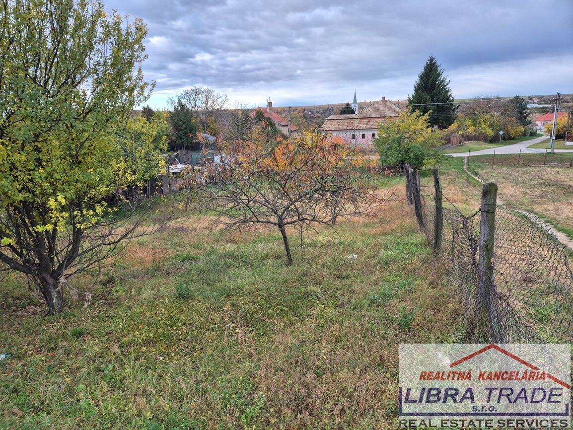 Stavebný pozemok v obci Dulovce. — foto 9
